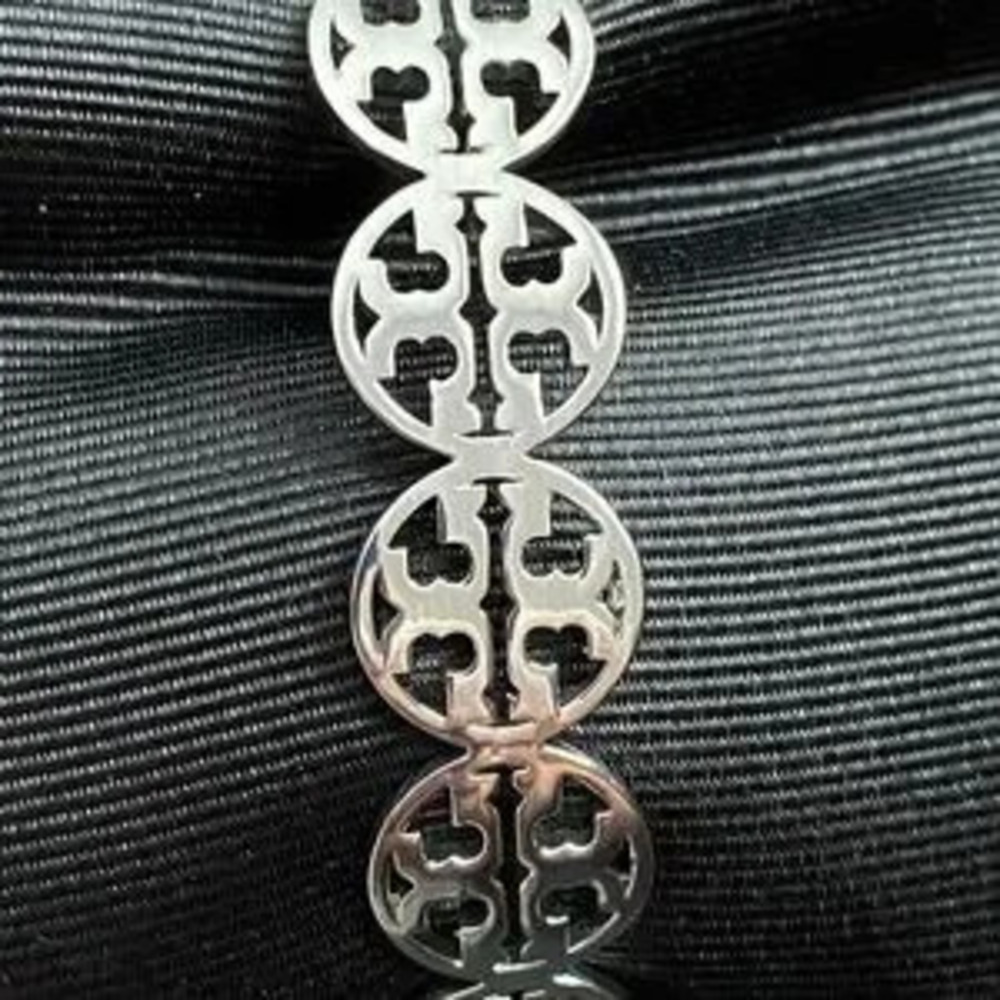 Tory Burch long earrings gold tone